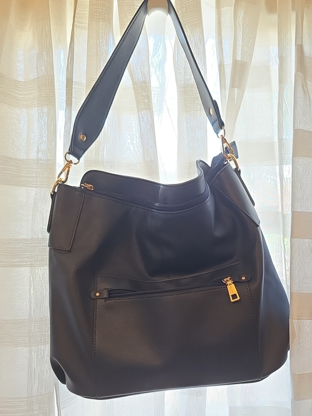 Elegant Navy Shoulder Bag with Gold Accents and Matching Wallet Wristlet